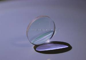 What is the difference between spherical and aspherical lenses?
